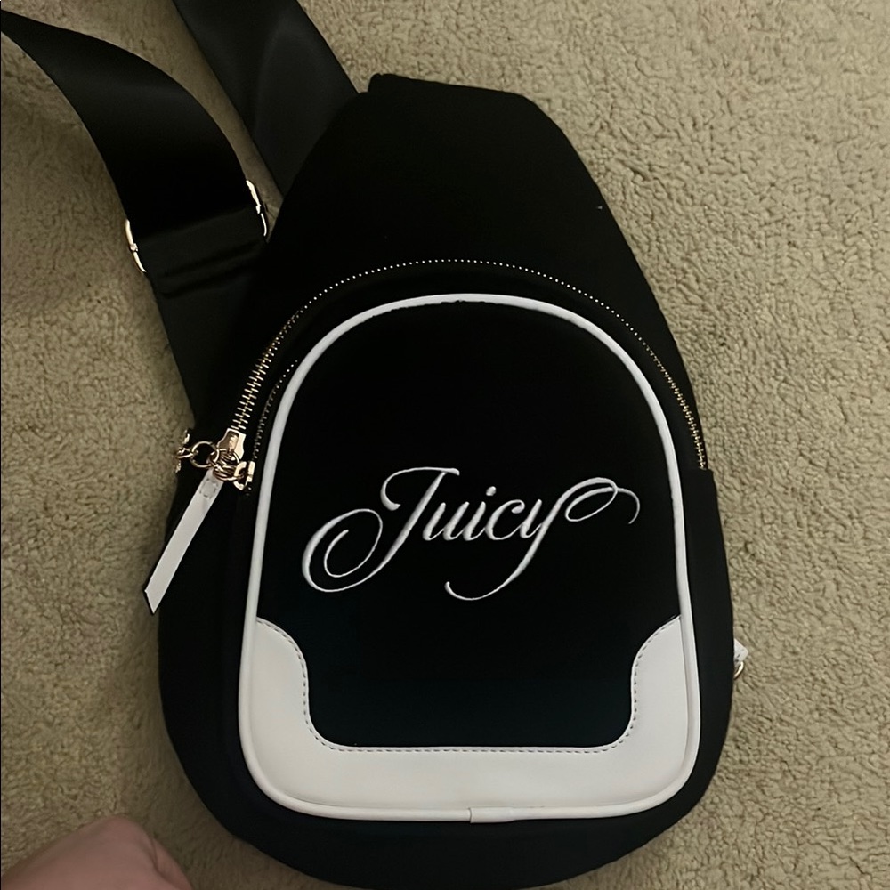 Juicy Couture Black and White Backpack with Elegant Script Logo